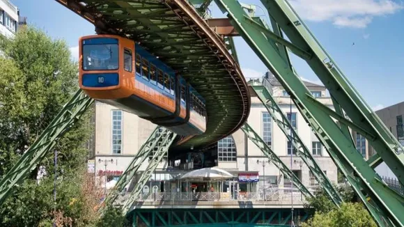 SKY TRAIN, Hanging train in germany, germany train, Wuppertal Suspension Railway, hanging train, germany hanging train, Dangerous, Travel, amazing world, dangerous train, train passenger, Train Runs Under the Track, hanging train, germany, weird, Unique Railway Track, bizarre, Upside down train, funny,