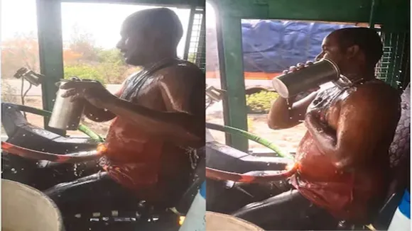 truck driver bathing video , truck driver bathing in truck , driver bathing inside truck on road , chalti truck mein nahaya driver , driver ke nahane ka video , truck mein nahaya driver , driver bathing moving truck viral video , ajab gajab news , viral news , world news",