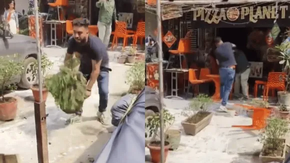 Viral Video,Man Beats Elderly,man Breaks Flower Pots Over Parking Issue,Parking Issue,Parking Issue in india,fight over Parking Issue,chaos over Parking Issue,man Breaks Flower Pots,viral,viral news,trending,trending news,news,latest news