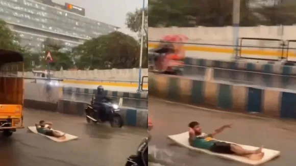 Pune, Pune rain, Pune rainfall, waterlogging, waterlogging after floods, Waterlogging After Rain, man surfs in pune rainfall, surfing on waterlogged road, rain video, Pune Viral Video, Pune rain Viral Video, mumbai rains, viral rain video, trending Video, Viral Video,