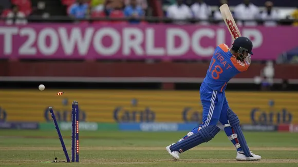 India's Virat Kohli is bowled out by England's Reece Topley during the ICC Men's T20 World Cup second semifinal cricket match between England and India at the Guyana National Stadium in Providence, Guyana