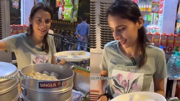 "Momos waali, momos waali ladaki, momos girl, momos waali girl, momos waali ladaki ka video, momos girl video, momos waali ke video, momos waali girl viral video, momos vendor, Famous momos seller, famous momos in delhi, famous momos in noida, viral video, viral girl, viral momos girl, viral news, trending video, trending news, social media,