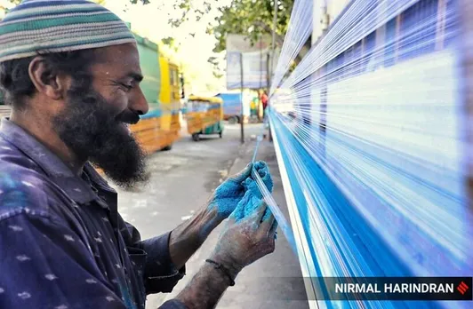 Kite strings being made by workers