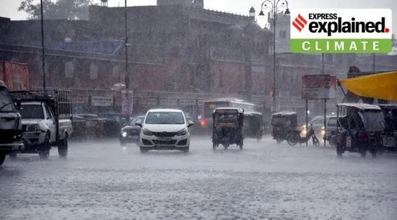 Vehicles wade through road amid heavy rains Lashes in Jaipur in March 2023. (Express Photo by Rohit Jain Paras)
