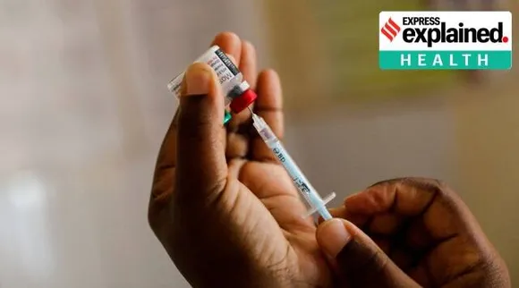 A nurse fills a syringe with malaria vaccine before administering it to an infant at the Lumumba Sub-County hospital in Kisumu, Kenya, July 1, 2022.
