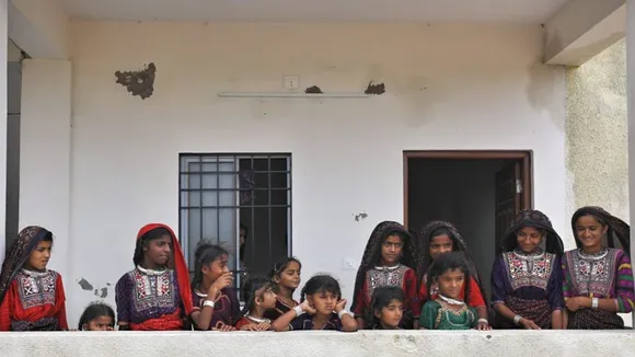 People belonging to Fakirani Jat tribe ( nomads of Great Rann of Kutch ) at a cyclone shelter in Jakhau on Thursday. Express photo by Nirmal Harindran, 15-06-2023, Bhuj, Gujarat