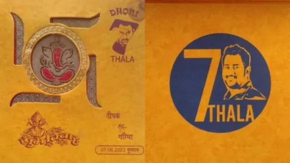 Dhoni fan printed photo in his wedding card