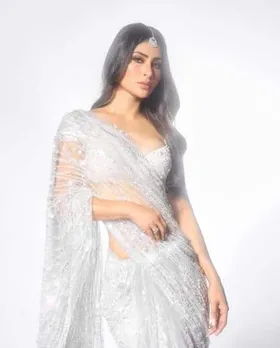 Mouni Roy looks hot in white net saree