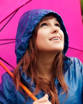 girl enjoying raining