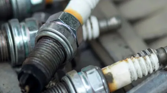 motorcycle spark plug change cost