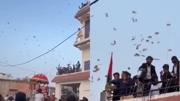 Groom’s family showers Rs 20 lakh cash during wedding