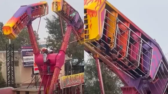 Passengers stuck, amusement ride