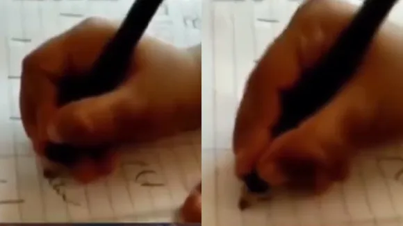 Kid trying to write B viral video