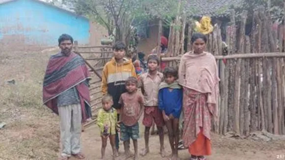 Adivasi family carry baby vegetable bag
