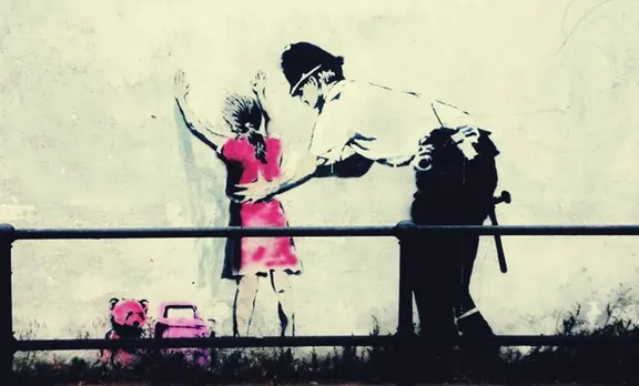 Frisking, Banksy