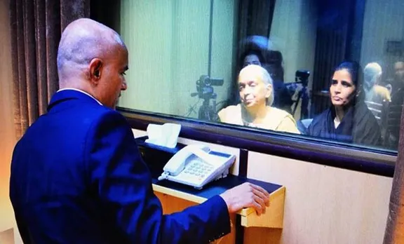 Kulbhushan Jadhav speaks to his wife, Chetna, and mother, Avanti, at the Pakistan foreign affairs office.