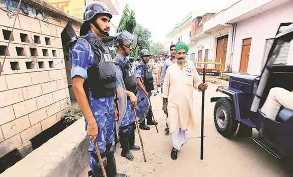 yogi adityanath, Uttar Pradesh, Muzaffarnagar, UP riots cases, up government, Sanjiv Balyan, muzaffarnagar riots case, Shamli riots, muzzaffarnagar riot case withdrawal, indian express, india news