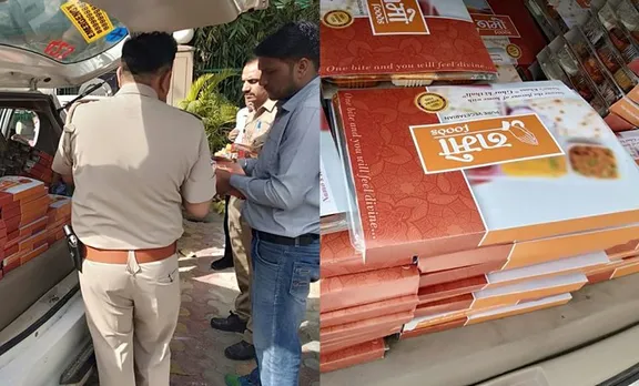വോട്ടിങ്ങിനിടെ പൊലീസുകാര്‍ 'നമോ' നാമം അച്ചടിച്ച ഭക്ഷണപ്പൊതി വിതരണം ചെയ്തു