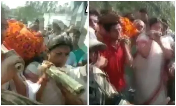 Smriti Irani Carries dead body