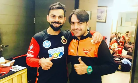 Rashid Khan,റാഷിദ് ഖാന്‍, Virat Kohli,വിരാട് കോഹ്ലി,Rashid Khan Virat Kohli,റാഷിദ് ഖാന്‍ വിരാട് കോഹ്ലി, Rashid Virat, Virat Kohli Bat, Rashid Bat, ie malayalam,