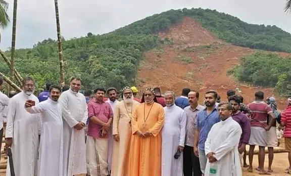 ദുരിതഭൂമിയിലെ ദുരന്തങ്ങള്‍; കവളപ്പാറയില്‍ നിന്നും പുരോഹിതരുടെ 'ഗ്രൂപ്പ് സെല്‍ഫി', പ്രതിഷേധം ശക്തം