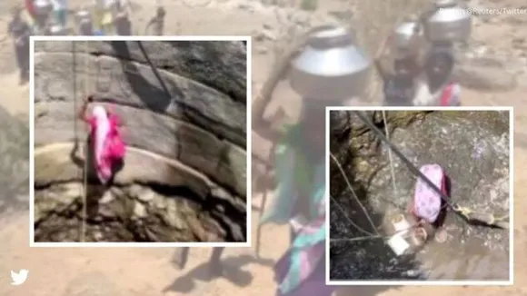 Women-climbs-down-well