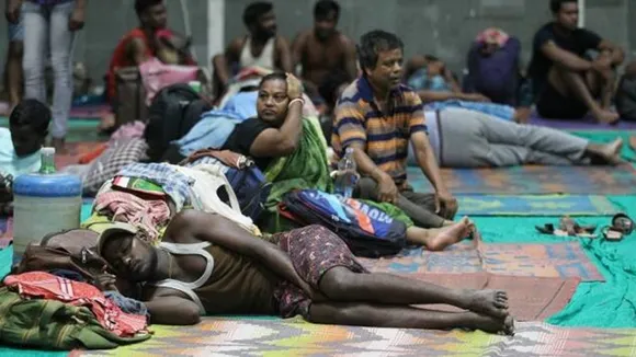 Families-evacuated-from-coastal-areas-at-a-shelter-in-Gandhidham-Kutch-on-Tuesday.-Nirmal-Harindran
