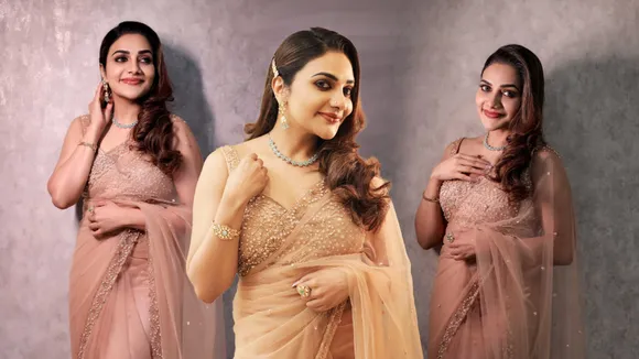 Rimi Tomy