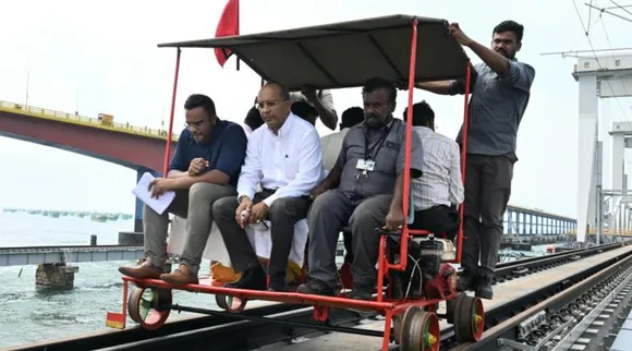  Madurai Divisional Railway Manager Sharad Srivastava inspects the newly built Pamban Railway Bridge Tamil News
