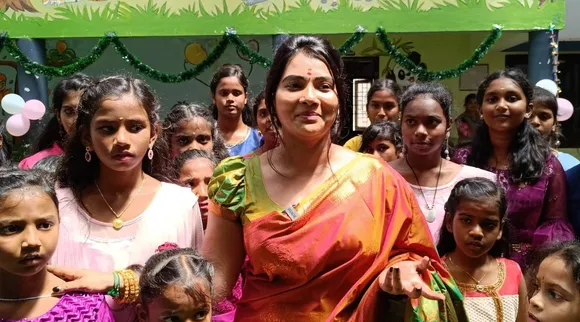 Dhivya Duraisamy with children