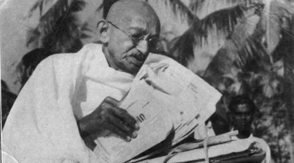 Mahatma Gandhi reading 2