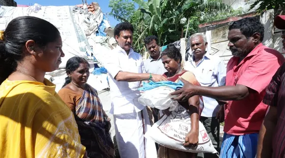 TN  Minister Anbil Mahesh inspects and provides relief House damage due to incessant rains Tamil News