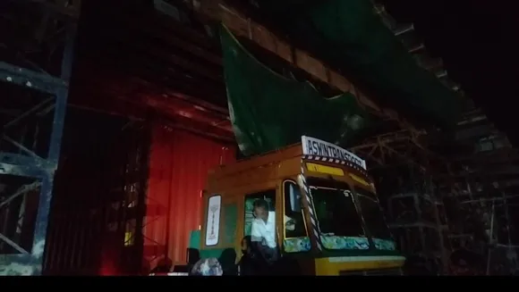 container truck stuck on flyover in covai