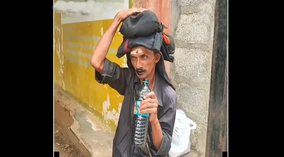 oil drinking man