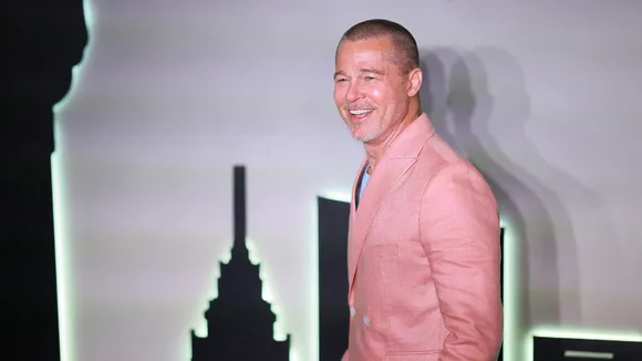 Brad Pitt Debuts New Haircut and Hints at Exciting New Role