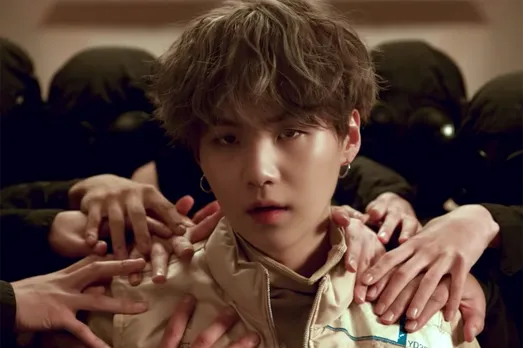 SUGA Casts a Dark Shadow