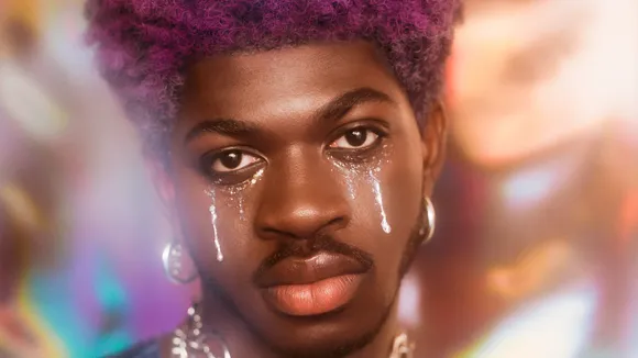 Lil Nas X Flaunts ‘Baby’ Bump in Pregnancy Shoot