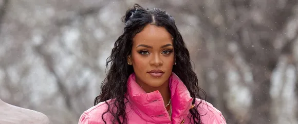 Rihanna Attends Lollapalooza Paris in Chic Sporty Ensemble to Support A$AP Rocky