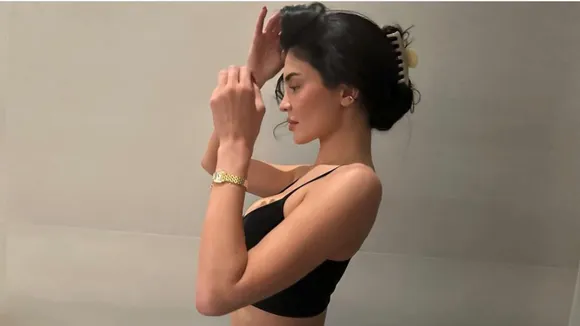 Kylie Jenner Looks Stunning in a Low-Cut Black Crop Top For a Relaxed Evening Out