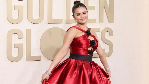 Selena Gomez Stuns in a Red Criss-Cross Dress at The 2024 Golden Globe Awards