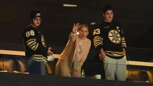 Céline Dion Vibes to Bon Jovi at NHL Game Appearance With Sons
