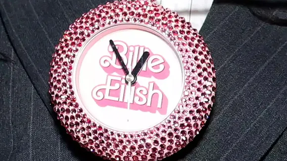 Flavor Flav Surprises Billie Eilish With Custom Barbie Clock Necklace at Oscars Afterparty