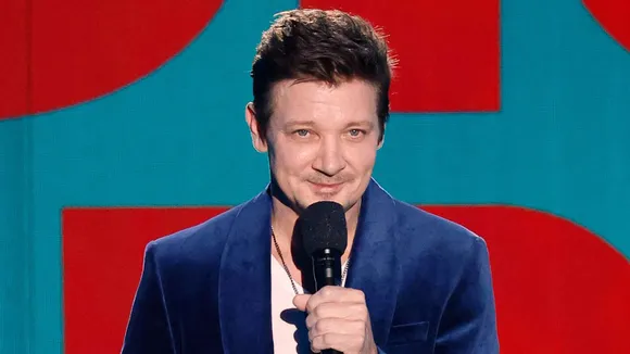 Jeremy Renner Works Out in His Basement With Massive Dumbbells