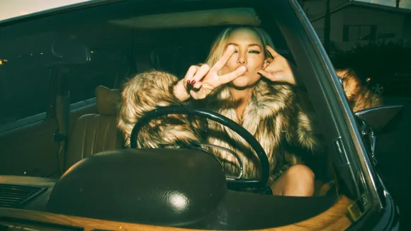 Kate Hudson Dons Dancing Attire in Vibrant 'Talk About Love' Music Video Debut