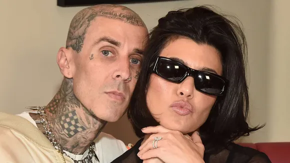 Travis Barker Shares Rare Snaps of Baby Son Rocky and Kourtney Kardashian on Her Birthday