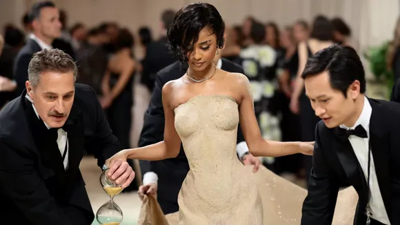 Tyla Stuns in Form-Fitting Sand Dress at The Met Gala 2024