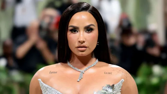 Demi Lovato Shines (Literally) in Silver Gown With 500 Hand-Cut Flowers at The Met Gala 2024