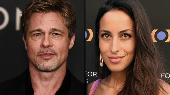 Brad Pitt and Ines de Ramon Display Affection at the British Grand Prix
