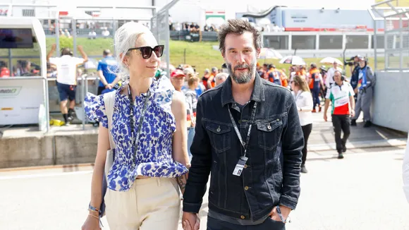 Keanu Reeves and Girlfriend Alexandra Grant Make Rare Appearance at MotoGP