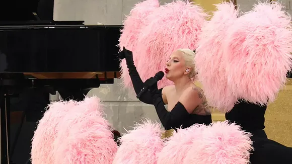 Lady Gaga Performs 'A Star Is Born' From Limousine Roof in Paris